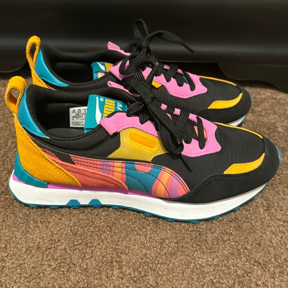 Puma sneakers.